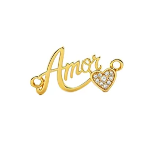 Gold Amor letter heart pendant DIY jewelry accessory sparkling cubic zirconia detail closeup