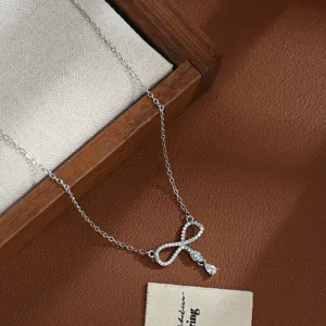 Elegant silver bow zircon clavicle necklace for women, delicate design pendant jewelry.
