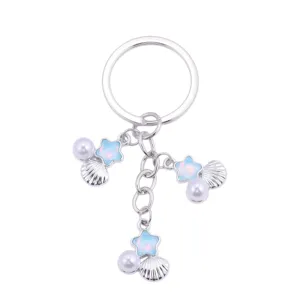 Eleganter Legierungs-Schlüsselanhänger mit Perlen- und Sternmuschel-Anhänger für Geschenke.