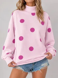 Sudadera holgada de mujer con cuello alto y manga larga rosa con lunares morados casual.