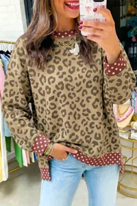 Casual leopard print sweatshirt with pink polka dot contrast trim and cozy loose fit design.