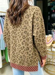 Leopard print colorblock sweatshirt with polka dot hem and cuffs, comfortable loose fit.