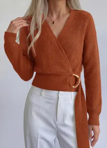 Close-up detail of the stylish V-neck wrap knitted sweater featuring a chic metal ring.