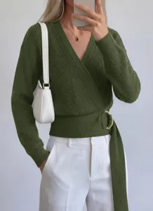 Close-up detail of the stylish olive green wrap V-neck knit sweater with side metal ring.