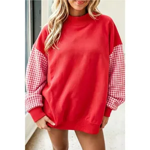 Sudadera oversize de cuello cisne para mujer con mangas largas a cuadros de contraste.
