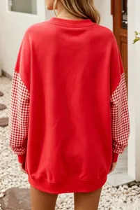 Sweat-shirt rouge pour femme à manches longues et élégants motifs à carreaux.