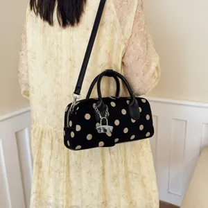 Korean style polka dot shoulder bag, casual black and beige handbag for daily commute.
