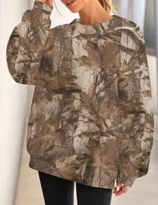 Detailed view of the women's tree branch pattern crewneck casual long sleeve sweatshirt.