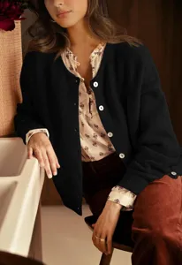 Women's knit cardigan solid black round neck long sleeve casual sweater apparel detail view