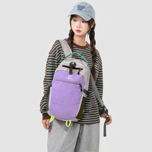 Detailed view of the multi-pocket casual outdoor backpack worn by a model in outdoor style.