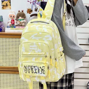 Casual sweet camouflage school backpack for women, large capacity stylish daypack.