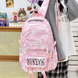 Pink camo backpack for women, large capacity casual school bag, cute college style travel daypack.