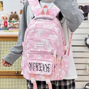 Pink camouflage student backpack with large capacity, cute sweet style for daily travel.