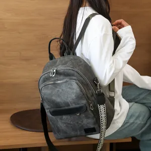 Zaino donna stile coreano moda vintage grigio con tracolla lavorata e dettagli eleganti.