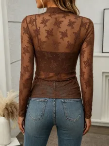 Trendy brown sheer mock neck long sleeve mesh top with cute floral flocking design.