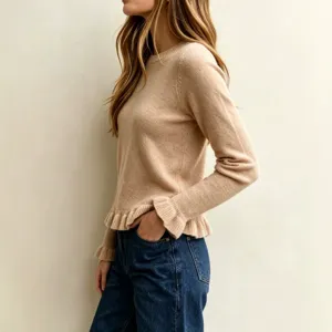 Classic beige crewneck knit sweater for women, featuring elegant ruffled hem and long sleeves.