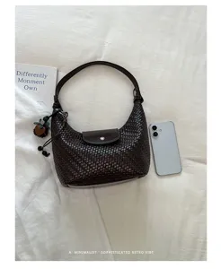 Chic woven hobo shoulder bag for women, premium retro underarm dumpling bag for daily commute.