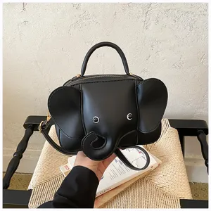 Detailed view of a cute black elephant shaped crossbody bag, creative niche design women handbag.