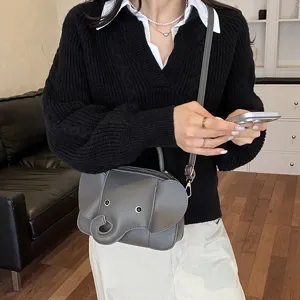 Cute cartoon elephant design crossbody handbag for women, stylish shoulder bag detail.