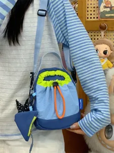 Korean style casual colorblock crossbody phone bag with drawstring and small pouch.
