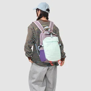 Detail view of the colorful outdoor hiking backpack with multi-pockets and adjustable straps.
