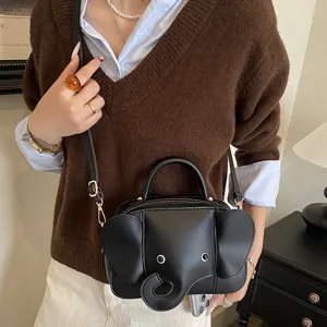 Cute cartoon elephant shape crossbody bag for women, niche design PU leather shoulder handbag.