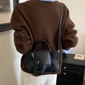 Creative cute elephant shaped crossbody bag for women, niche design black leather purse.