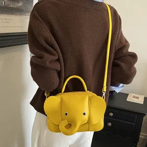 Cute yellow elephant shaped crossbody handbag, creative cartoon shoulder bag for women.