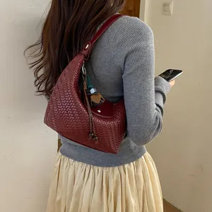 Woven leather underarm shoulder bag stylish dumpling purse for women commuting daily wear