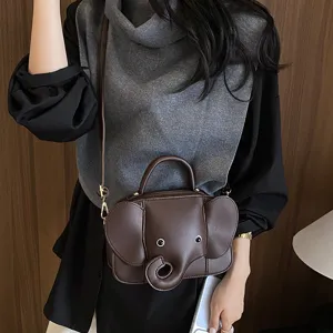 Cute cartoon elephant shaped crossbody bag for women, novelty leather shoulder handbag.