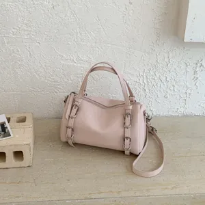 Borsa a tracolla rosa chic in pelle da donna, elegante borsa a mano con fibbie in metallo.