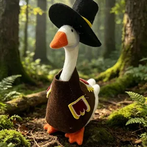 Close-up detail of plush goose in forest scene wearing cute pilgrim hat and brown vest.