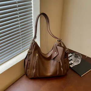Brown PU leather shoulder tote bag with front zip pockets and mini pouch detail for women