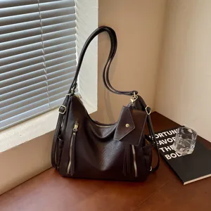 Large capacity dark brown convertible shoulder bag and backpack for women daily commute style.