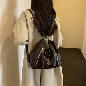 Chic brown women's tote backpack stylish commuter large capacity leather handbag fashion casual.