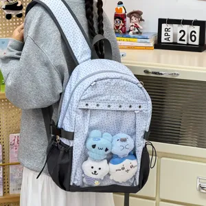 Zaino scolastico a pois in stile giapponese per donne e studentesse con tasca frontale.