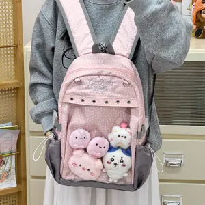 Zaino rosa a pois in stile giapponese con tasca frontale trasparente e simpatici peluche.