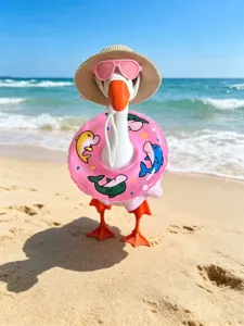 Beach resort style detail view of cute doll straw hat sunglasses and pink swim ring set.