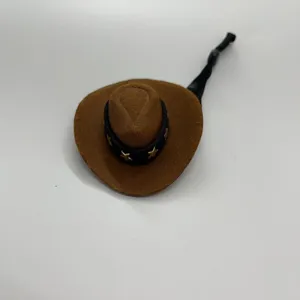 Mini brown cowboy hat with gold star details, cute doll hat accessory for desktop toys and ducks.