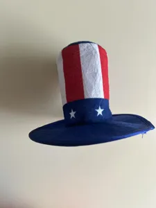 Detail shot of the patriotic Uncle Sam top hat with red white stripes and stars for holiday decor.