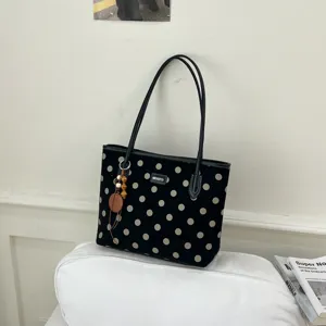 Black polka dot canvas tote bag, large capacity casual shoulder bag for daily commute.