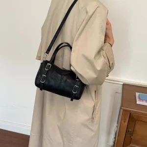 Borsa a tracolla in pelle nera da donna, borsa casual elegante e versatile con fibbie in metallo.