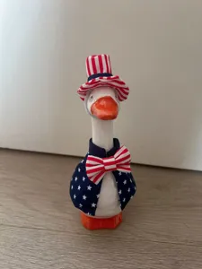 7 inch ceramic duck figurine with USA patriotic costume top hat and star cape for decor