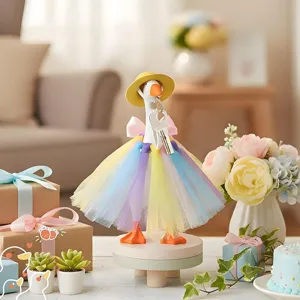 Desktop little goose key holder with yellow hat and colorful tutu skirt ornament set.