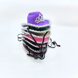 Detailed view of colorful mini cowboy hats featuring silver tiara and sparkling trim.