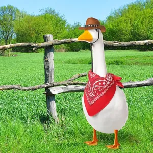 Cute white goose doll featured with a western cowboy hat and red bandana in detail.