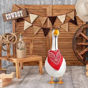 Detailed view of the cute goose western cowboy hat and red bandana set for doll party decor.