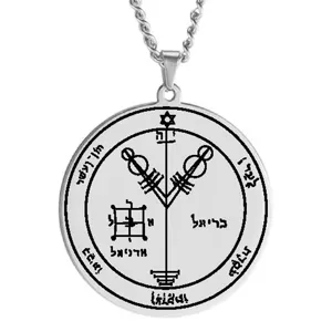 Close-up detail of the stainless steel Solomon seal amulet pendant with engraved mystical symbols.