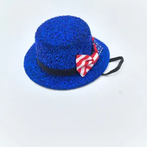 Blue sequin mini top hat with American flag bow and elastic strap for holiday party decoration.