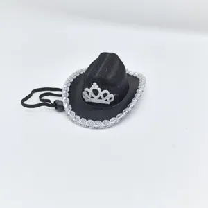 Mini black cowboy hat with silver glitter crown and metallic brim for party events.